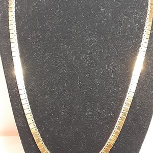 Long gold tone necklace